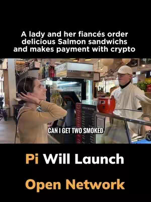 The cover image captures a scene inside a cafe. A woman with dark hair, wearing a tan sweater, is looking to her left with a restaurant worker in frame. The worker is dressed in a white uniform and hat. Behind them, there's a display with menu items and an area to take orders. At the bottom is text, 'Pi Will Launch Open Network'.