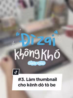 The cover image is an overhead shot of an iPad or tablet device resting on a desk, with a hand partially visible on the left side of the frame. The background is slightly blurred, suggesting an indoor setting. The text overlay is placed across the apparent screen space and a smaller frame, where the text "#3. Làm thumbnail cho kênh dò tò be" is displayed. The overall composition is a mix of technological focus against a blurred environment.