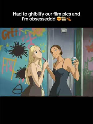 An anime-style digital illustration depicts two women in a Ghibli-esque aesthetic against a painted wall. One woman holds a makeup brush, applying lipstick to the other. The woman on the right holds a cup. The color palette is vibrant, with bold strokes and animated details.