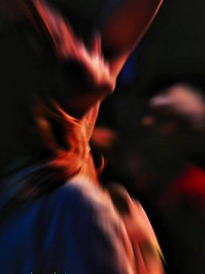 The cover image is an abstract, blurred shot with a reddish-orange hue dominating the frame. The composition appears to be of a person with their head tilted back and arms raised, captured in a dynamic, almost explosive motion. The colors and blur give the image a sense of energy and possibly worship or praise.