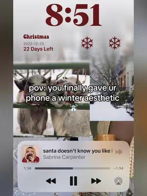 The cover image shows a phone screen displaying a winter aesthetic, featuring a snow-covered scene with reindeer and a music player. The time is displayed at the top, along with the date and a countdown to Christmas. A text overlay reads 'pov: you finally gave ur phone a winter aesthetic.' A music player shows a song playing with a thumbnail of Sabrina Carpenter.