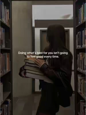 A person with long hair is seen from the back, standing in a library, holding a stack of books. Text is overlaid on the image.