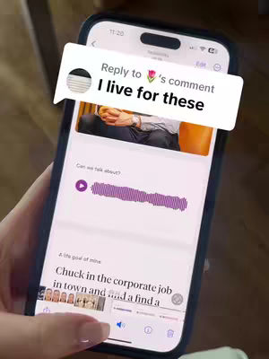 A hand holding a black phone with a white overlay. The overlay has text and a comment bubble. The phone is displaying a screen with an app's interface.