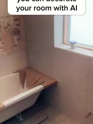 The image shows an unfinished bathroom renovation. A bathtub is visible, with a wooden structure or shelf partially built above it. The walls are unfinished, and the overall setting suggests a work-in-progress.