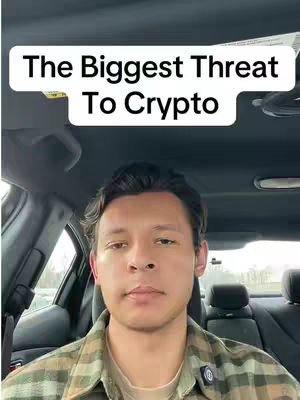A man sits in the front seat of a car, facing the camera. A white text box overlaid at the top of the image reads, "The Biggest Threat To Crypto."