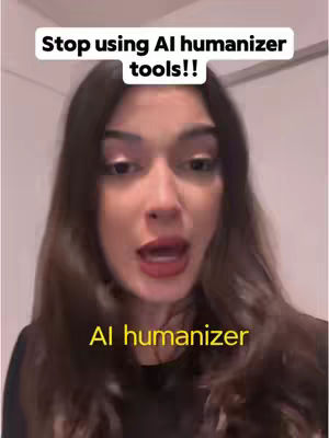 A woman with long brown hair is centered in the frame, looking towards the camera with an open mouth. The background is blurred, and there are overlaid text elements.
