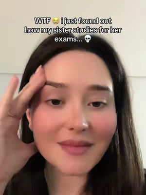 The cover image features a close-up of a young woman with dark hair looking slightly to the side. She is pale-skinned with dark eyebrows and a touch of blush. The text overlay at the top indicates this is a study-related video about how her sister studies for her exams. The background is blurred, focusing attention on her face.