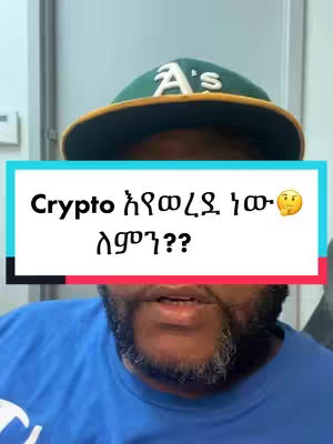 A selfie-style image featuring a Black man wearing a green and yellow baseball cap. The cap's brim is yellow, while the crown is dark green, with the white letter "A" visible. The man has a beard, and light is from the top.