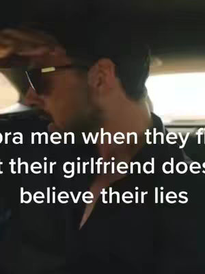 A man wearing sunglasses is seen from the shoulders up, inside a vehicle. White text overlays the image.