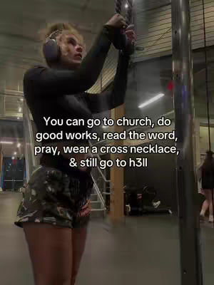 A woman in a gym setting is shown from the knees up, with text overlaid on the image. She's wearing workout attire and holding onto equipment, suggesting an exercise routine, with gym racks and equipment subtly visible in the backdrop.