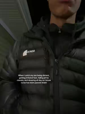 Image shows a person from the chest up in a black puffer jacket. Text is overlaid on the bottom portion of the image. The person is in an outdoor setting.