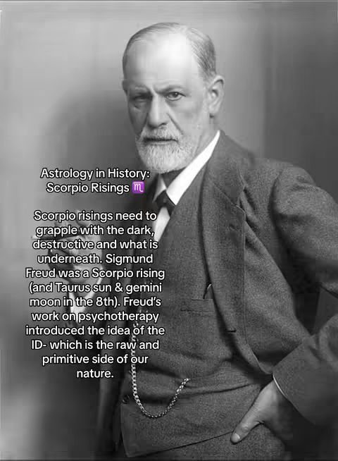 A black and white photograph of Sigmund Freud, the father of psychoanalysis. He is shown from the chest up, wearing a dark suit and tie, with a serious expression.