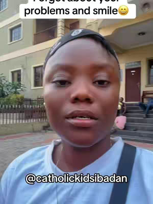 A close-up shot of a person facing the camera, with a bright, well-lit environment in the background. The person's facial expression is neutral. Text overlays are placed at the top and bottom of the frame.