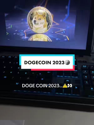 The cover image displays a laptop screen showcasing a Dogecoin logo. A text overlay, on a colored background, reads 'DOGECOIN 2023'. Below, a keyboard's keys are visible.
