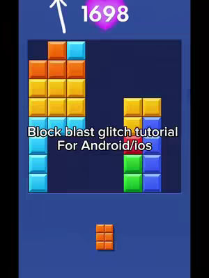 The image shows a screenshot of a mobile game interface. Blocks of different colors are arranged to fit into certain block designs on the screen.