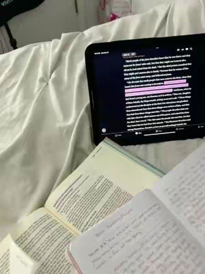 The cover image shows a person studying in bed. An open book and a notebook are present, along with a tablet displaying text. All items rest on a white bedsheet.