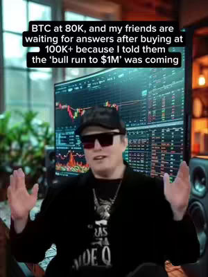 A man with sunglasses holds his hands up, while a stock graph is visible on the monitor in the background, with the captions saying something about Bitcoin.
