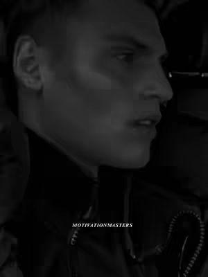 A black and white image showing a man's face in profile, emphasizing the side view. The lighting creates strong shadows, especially accentuating the contours of his nose, cheekbone, and jawline. The man appears to be looking off in the distance, and his facial expression is serious. The overall composition is focused, with a simple focus on the man's form and expression.
