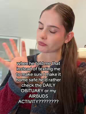 A woman with brown hair in a high ponytail, wearing a patterned sweater, gestures with her right hand as she speaks. Overlayed text in white font provides a narrative about a past relationship.