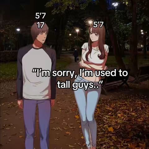 An anime-style image depicts a dusk outdoor scene with two figures. A man stands on the left in a black and white baseball tee and purple jeans, looking slightly to the side. A woman on the right is dressed in a white shirt and blue jeans. Text overlay reads, “I'm sorry, I'm used to tall guys..”. Numbers, 5'7 and 17 are placed above both figures.. The background shows a path, trees, and streetlights.