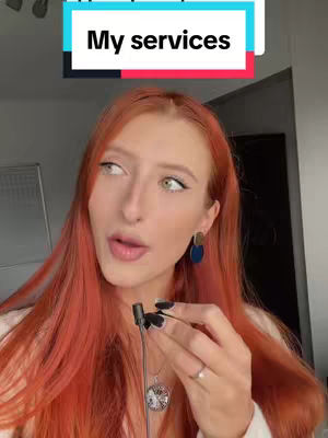 A woman with long red hair holds a microphone, framed from the chest up. She wears a simple white top and gold earrings. The background is a plain, lightly lit space. Above her is a text box with "My services."