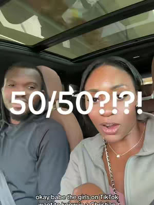 A selfie inside of a car with a woman and a man. The woman is in the foreground and the text overlay covers some of her face.