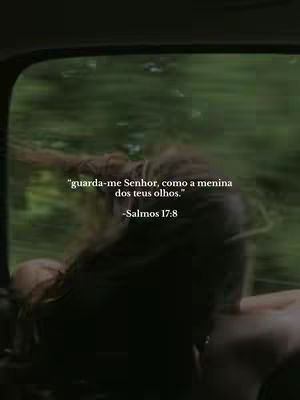 A blurred image through a car window. A person with long hair is seen from behind, their head turned slightly towards the viewer. Green foliage is visible outside the window, creating a sense of movement.. Overlaid text is in white.