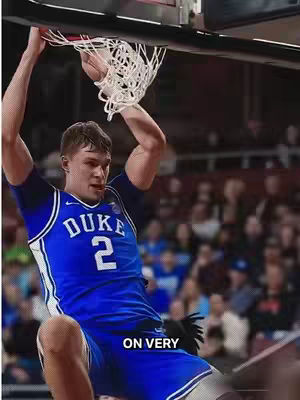 A cover image captures a basketball player in mid-air, completing a dunk. The player, wearing a blue Duke University jersey with the number 2, is seen from a low angle, emphasizing the athleticism. The background shows a blurred audience, suggesting a game setting.