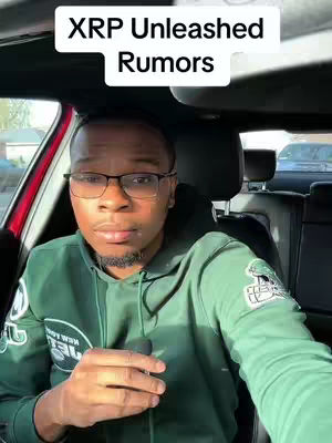A man wearing glasses and a green hoodie sits inside a car. A white text box at the top of the image reads "XRP Unleashed Rumors".