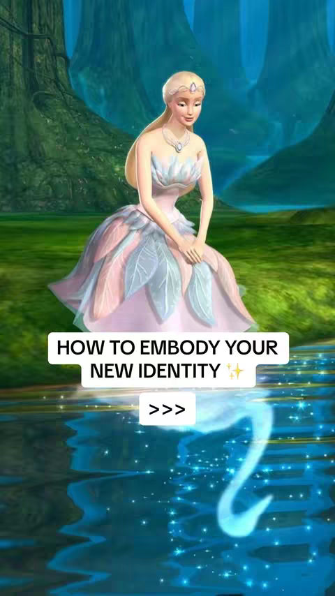 A digitally created image featuring a woman dressed as a fantasy character set in a serene landscape. The central figure, a fair-skinned woman with long blonde hair adorned with a headband, wears a strapless gown with a detailed bodice and a distinctive skirt resembling large, stylized leaves in pink and blue hues. She is positioned in the foreground, appearing to be sitting pensively near a body of water that reflects the sky. Behind her, a lush green forest and a dreamy blue sky create a tranquil backdrop. The overall aesthetic is whimsical and ethereal.