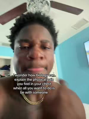 The cover image shows a close-up of a young Black man's face. He has short, dark, curly hair and is looking at the camera. His expression is a mix of concern and sadness. The background is blurred but appears to be part of a room with a light blue wall and a ceiling fan. Text is added to the image in a white, sans-serif font describing emotions of missing someone.
