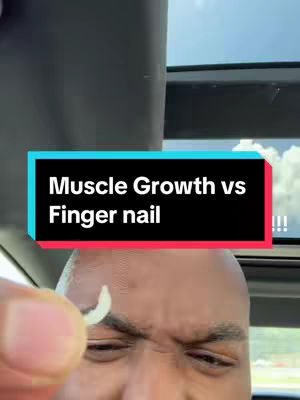 A close-up shot of a man's face focusing on him holding a fingernail which is separated from his finger. The video is aimed at a fitness audience.