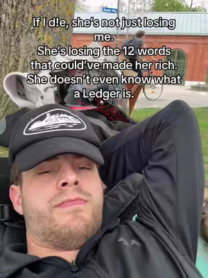 The cover image shows a man lying on a surface, presumably grass, with a baseball cap and black jacket. Text overlays are added to the image.