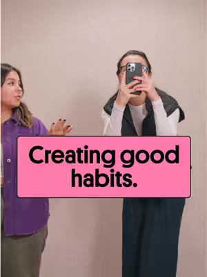 The cover image shows two women in front of a plain wall. The woman on the left is wearing a purple shirt and gesturing with her hands. The woman on the right is holding a phone up, as if taking a picture. A pink rectangle with the text "Creating good habits." is in the middle.
