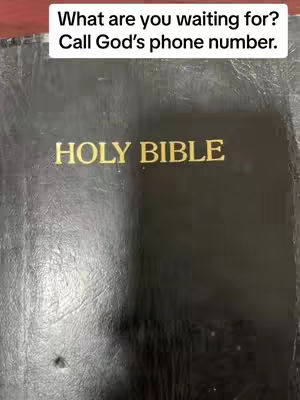 The cover image shows a close-up of a Holy Bible, its black cover reflecting some light. The title "HOLY BIBLE" is written in gold lettering. Above the book, text overlayed in white and reads "What are you waiting for? Call God's phone number."
