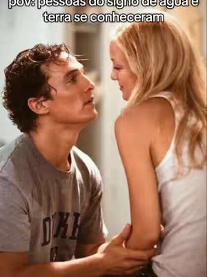 The image shows a man and a woman looking at each other in a romantic pose. The woman is blonde, and the man has dark hair.