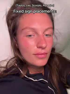 A close-up shot of a woman. She is looking towards the viewer with a neutral expression. Text overlays the top of the image.