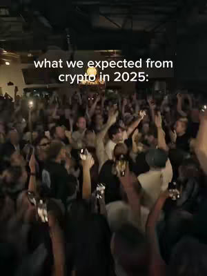 The image shows a crowd of people at a concert or event with their hands up, illuminated by stage lights and cell phone lights. Text overlaid on the image reads, "what we expected from crypto in 2025:"