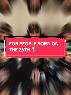 A blurred image featuring multiple human figures with a central focus on a person enclosed in a red rectangular frame that contains text. The background has radial blur effect emphasizing the central region.