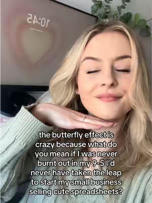 A young woman with blonde hair is seen close-up, eyes closed, with her hand under her chin and a ring on her finger. Text overlays depict the 'butterfly effect' concept in relation to starting a small business. In the background is a screen displaying the time.