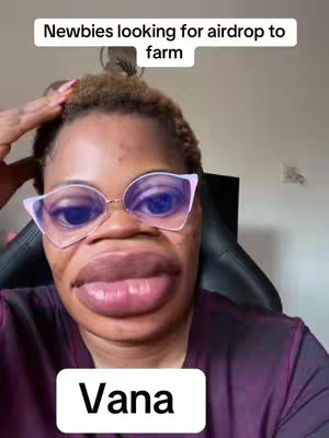 A selfie-style video featuring a woman with an exaggerated facial expression due to a filter effect. She wears glasses and the text overlay indicates the video is about "Newbies looking for airdrop to farm."