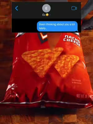 The cover image shows a close-up of a partially visible red bag of Nacho Cheese Doritos, with two tortilla chips in the foreground. Overlaid at the top-left is a simulated text message conversation on a black background. One message includes the text 'Been thinking about you a lot lately...'