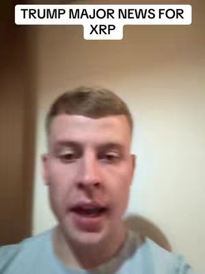The cover image shows a close-up shot of a man's face, likely the creator, directly facing the camera. Above his head, within a white rectangular block, is the text overlay "TRUMP MAJOR NEWS FOR XRP". The background appears to be a softly lit interior space. The man's expression seems neutral, possibly indicating a serious or informative tone. The composition is simple, with the man's face filling much of the frame and the text serving as a clear headline.
