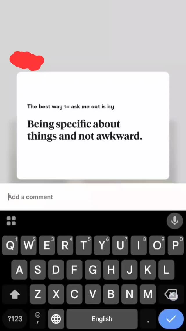 The image shows a close-up of a phone screen displaying a partially typed text message alongside a digital keyboard, with a red shape in the top left corner. The text box has a message that starts with 'The best way to ask me out is by' and a line below it saying 'Being specific about things and not awkward.' Below this is a digital keyboard. A visible indication that the user is typing a message.