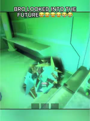 The image is a screenshot from a video game featuring a first-person perspective. The scene is predominantly green, likely influenced by the game's color palette or a filter effect. The environment suggests an indoor setting with some degree of unfinished construction or a run-down interior. In the foreground, there appears to be a scattering of polygonal shapes, which might be debris or a visual effect. Text overlayed on the image reads 'BRO LOOKED INTO THE FUTURE' in a capitalized, bold font, above a series of laughing and crying emojis. Near the bottom of the image, there are navigation or interface elements. The overall composition is dynamic, capturing a moment of gameplay.