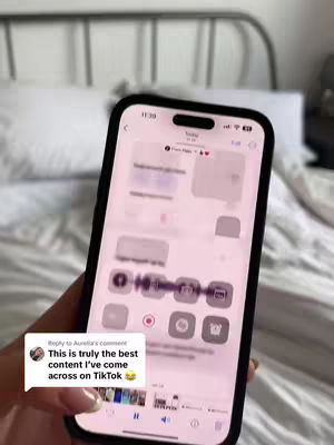 A person's hand holding an iPhone, showing a screen with a recording being done, along with a comment box.