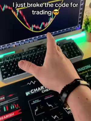 The cover image shows a person's hand pointing towards a computer screen displaying a stock chart. The screen is in the background, showing a complex chart with red and green lines. In the foreground is a keyboard, a desk with charts and the person's hand.