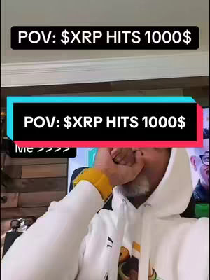 A man in a white hoodie covers his mouth with his hand, with text overlays at the top and bottom of the image. The top text reads 'POV: $XRP HITS 1000$'. The background shows a television.