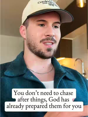 A man with a trimmed beard and a baseball cap looks towards the right of the frame. Text overlaid at the bottom advises that "You don't need to chase after things, God has already prepared them for you."