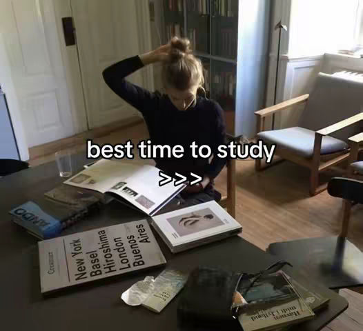 A woman is shown sitting at a table covered in books, with one hand in her hair, appearing to be studying. Text overlayed reads "best time to study" with arrows.
